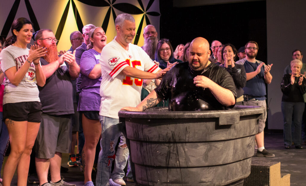 A baptism celebrated during a Revolution Church service